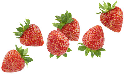 Falling strawberries isolated on white background