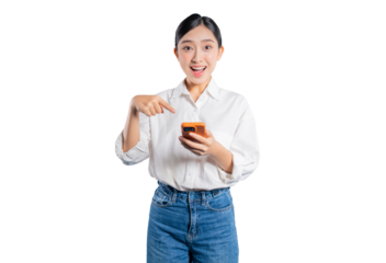Asian woman with one hand on her hip looks up and points, as if having a great idea, a positive thought, or noticing an advertisement in the copy space above.