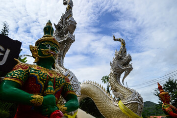 Obraz premium Statues of Serpent Guarding temples, Lanna Architecture, Symbols of Buddhism, South East Asia