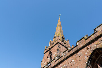 Steeple of a Christian church in landscape orientation with copy space, religion or religious image