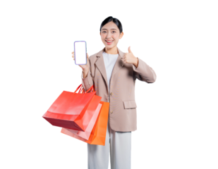 young Asian woman holding shopping bags looks at her smartphone with a bright smile, possibly communicating with friends about her purchases or browsing for more deals online, against a png