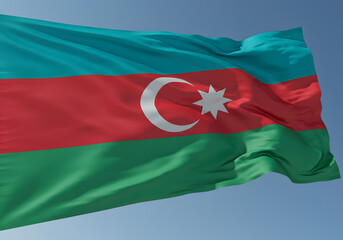 Azerbaijan Flag Waving in Blue Sky - Symbol of Azerbaijani Identity, Nation, and National Pride.