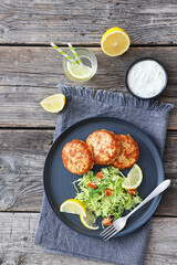 Hot Smoked salmon burgers, patties and coleslaw
