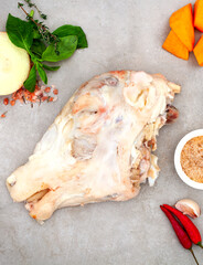 Preparing a sheep's head, a traditional South African dish