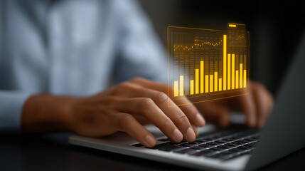 Close-up of Hands Typing on Laptop with Holographic Analytics