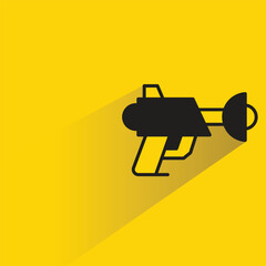 sci fi and space gun with shadow on yellow background