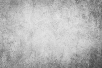 Fototapeta premium Abstract panorama featuring aged wall texture with cement and gray tones, accented by black and silver details on a white backdrop