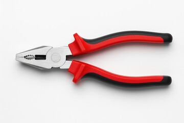 Fototapeta premium New metal pliers with red rubber grips viewed from above for repair and construction purposes