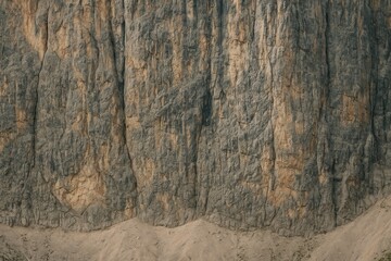 Naklejka premium Vertical mountain as a wall with a perpendicular structure