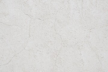 Obraz premium Abstract background featuring a weathered white cement wall texture