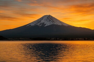 Fototapeta premium Sunset view of Mount Fuji reflected on Lake Kawaguchiko in Yamanashi