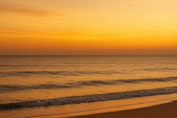 Obraz premium Serene ocean view at dusk with warm golden tones and calm waters, perfect for relaxation, meditation, or nature themes