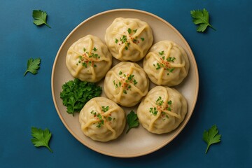 Classic steamed dumplings served on a plate with a blue backdrop, top-down perspective