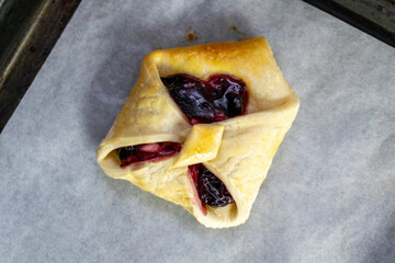Envelopes from dough with jam. Puff pastry. Dessert