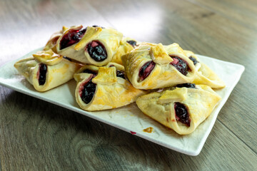 Envelopes from dough with jam. Puff pastry. Dessert