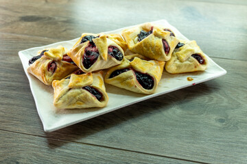 Envelopes from dough with jam. Puff pastry. Dessert