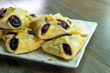 Envelopes from dough with jam. Puff pastry. Dessert