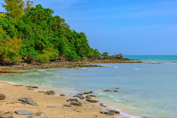Turquoise blue waters and Lush green islands of the coast of Cape Panwa located on the eastern side of Phuket island in Thailand