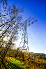Winter landscape with power lines near Wuppertal. Nature in the forest.

