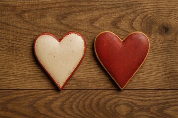Obraz premium Charming vintage hearts displayed on a rustic wooden surface, celebrating love and Valentine's Day