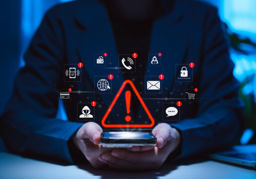 Online scam alert and cybersecurity warning concept. Person holding phone with red warning symbol and security threats icons, online scams, cybercrime risks, fraud prevention, digital safety awareness - Powered by Adobe