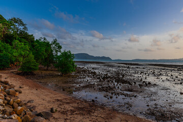 Sunset Beautiful view from Kao Khad next to Cape Panwa on the island of Phuket Thailand. Views of the turquoise Blue waters of the Andaman Sea and small islands off the coat of Phuket