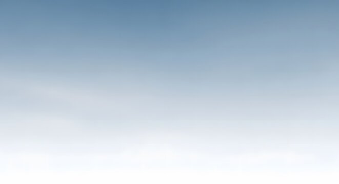 Soft gradient of pale blue and white sky, subtle cloud formations.