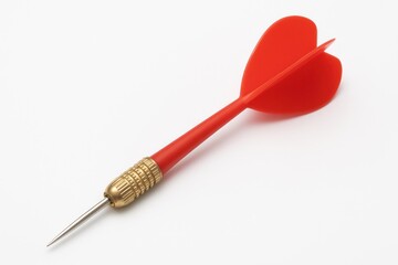 Single red dart on a plain white backdrop