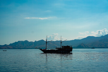 Traditional Pinisi Ship Sailing in the Open Sea