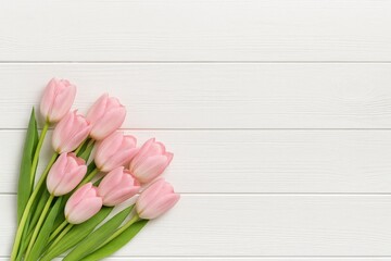 Fototapeta premium Bright pink spring tulips displayed against a whiteboard backdrop with space for custom text