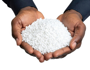 Two hands holding a pile of small white plastic pellets against a black background.