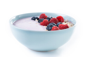 Healthy smoothie bowl with berries isolated on white background