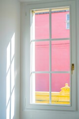 White window frame with pink building view bright light interior design home decor
