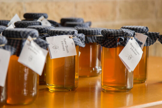 Raw honey bottled up to sell