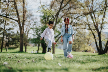 A cheerful moment of a mother and child playing with a ball outdoors in a lush green park during a sunny day, capturing the joy of spending quality family time in nature.