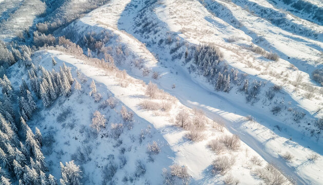 Snowy landscape of hills view from above