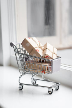 Christmas concept, gifts in a trolley