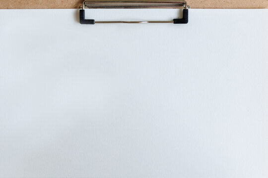 Top view of blank canvas clipboard with empty white drawing paper for text and object. Mockup blank drawing board background in art or information message sign board.