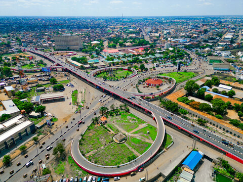 Aerial view of Kofar Nassarawa bridge, with its intricate loops and roadways, contrasts with the dense urban sprawl, Kofar Nassarawa, Kano, Nigeria.