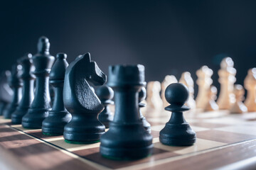 Chess pieces on chess board at begining of game, competition, planning and strategy