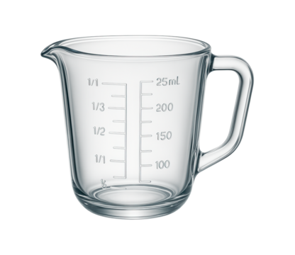 Heat-resistant borosilicate glass measuring cup for measuring hot liquids in a residential kitchen.