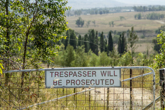 Trespasser will be prosecuted sign on a paddock gate