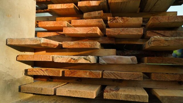 Stacked wooden planks, close-up, smooth camera movement