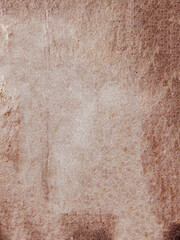 Textured brown stone surface with natural patterns