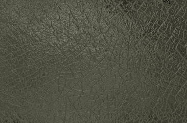 Dark green textured background creating a distressed and cracked surface effect