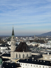 Naklejka premium Panoramic View of Salzburg with Historic Cityscape and Alpine Backdrop