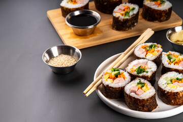 Traditional Korean food kimbap, with ham, vegetables and lettuce