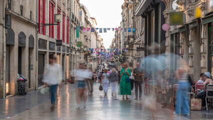 People walking and shopping in Rue Sainte-Catherine timelapse, Bordeaux, France.
