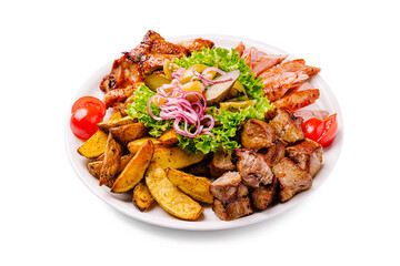 Savory platter featuring grilled meats, fresh vegetables, and seasoned potatoes