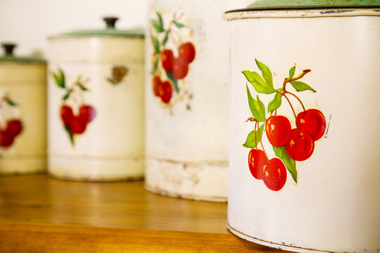 A set of antique tin cannisters